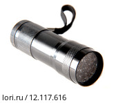 small electric flashlight on a white background. Стоковое фото, фотограф Andrey Lipinskiy / PantherMedia / Фотобанк Лори