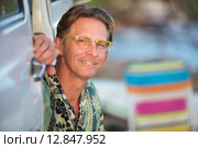 Cute Smiling Man Outdoors. Стоковое фото, фотограф Scott Griessel / PantherMedia / Фотобанк Лори