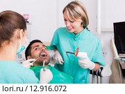 doctor and frightened patient at clinic. Стоковое фото, фотограф Яков Филимонов / Фотобанк Лори