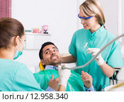 Dentist and scared patient. Стоковое фото, фотограф Яков Филимонов / Фотобанк Лори