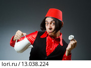 Man wearing red fez hat. Стоковое фото, фотограф Elnur / Фотобанк Лори
