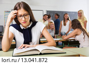 Lonely sad student in the classroom. Стоковое фото, фотограф Яков Филимонов / Фотобанк Лори
