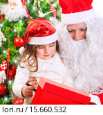 Little girl with Santa Claus. Стоковое фото, фотограф Anna Omelchenko / PantherMedia / Фотобанк Лори