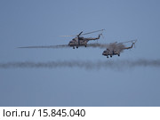 Транспортный боевой вертолёт Ми-8АМТШ ВВС России производит пуск неуправляемых ракет С-8. Редакционное фото, фотограф Михеев Алексей / Фотобанк Лори