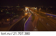 Движение автомобилей по транспортной развязке: Ленинградский проспект - третье транспортное кольцо. Видео с коптера. RAW. Стоковое видео, видеограф Евгений Ковалев / Фотобанк Лори