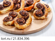 Palmier biscuits - french cookies made of puff pastry and chocolate. Стоковое фото, агентство BE&W Photo / Фотобанк Лори