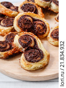 Palmier biscuits - french cookies made of puff pastry and chocolate. Стоковое фото, агентство BE&W Photo / Фотобанк Лори
