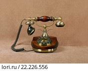 Retro wooden phone on brown velvet. Стоковое фото, фотограф ElenArt / Фотобанк Лори