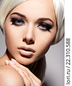 Woman's face with fashion black makeup of eye and long black eyelashes. Стоковое фото, фотограф Валуа Виталий / Фотобанк Лори