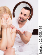 Husband comforting wife in bedroom. Стоковое фото, фотограф Яков Филимонов / Фотобанк Лори