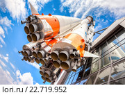 Russian space transport rocket with rocket engines against the blue sky. Редакционное фото, фотограф FotograFF / Фотобанк Лори