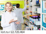 female pharmacist posing in drugstore. Стоковое фото, фотограф Яков Филимонов / Фотобанк Лори