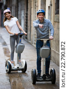 Young couple driving segways. Стоковое фото, фотограф Яков Филимонов / Фотобанк Лори