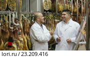 butcher and assistant with jamon joints. Стоковое видео, видеограф Яков Филимонов / Фотобанк Лори