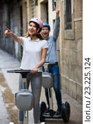 Young couple driving segways. Стоковое фото, фотограф Яков Филимонов / Фотобанк Лори