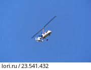 Автожир Auto Gyro MTO Sport (бортовой номер RA-0148A) на фоне синего неба (2016 год). Редакционное фото, фотограф Александр Замараев / Фотобанк Лори