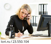Middle-aged businesswoman working in office. Стоковое фото, фотограф Оксана Кузьмина / Фотобанк Лори