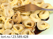 Тортелли́ни (итал. Tortellini) — итальянские пельмени из пресного теста с мясом, сыром или овощами (народн. сленг - "пупок") Стоковое фото, фотограф Леонид Штандель / Фотобанк Лори
