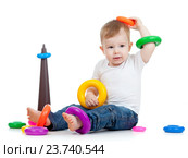 funny child playing with color toy. Стоковое фото, фотограф Оксана Кузьмина / Фотобанк Лори