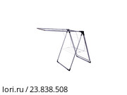 Collapsible clotheshorse isolated on the white background. Стоковое фото, фотограф Elnur / Фотобанк Лори