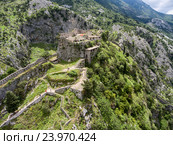 Руины крепости Святого Джона (St. John or San Giovanni) и на холме и туристическая тропа из города Котор, Черногория (2016 год). Стоковое фото, фотограф Кекяляйнен Андрей / Фотобанк Лори