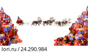 Many gifts and a deer sleigh of Santa Claus. Стоковое фото, фотограф Владимир Мельников / Фотобанк Лори