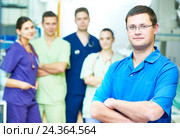 Hospital medic staff. young surgeon doctors team at operation room. Стоковое фото, фотограф Дмитрий Калиновский / Фотобанк Лори