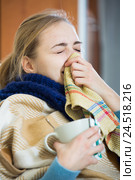Young woman suffering of cold and having stuffy nose. Стоковое фото, фотограф Яков Филимонов / Фотобанк Лори