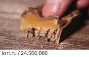Chocolate Bar On A Table Squashed. Стоковое видео, видеограф Денис Малышев / Фотобанк Лори