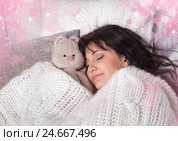 Girl sleeps in a bed with a toy a teddy bear. Стоковое фото, фотограф ElenArt / Фотобанк Лори
