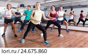 Happy adults having group fitness class. Стоковое фото, фотограф Яков Филимонов / Фотобанк Лори