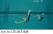Underwater view of Synchronized Swimming. Стоковое видео, видеограф Некрасов Андрей / Фотобанк Лори