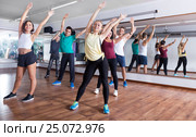Happy adults having group fitness class. Стоковое фото, фотограф Яков Филимонов / Фотобанк Лори