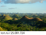 Sunset on the Chocolate Hills, Bohol, Philippines. Стоковое фото, фотограф Ершов Максим / Фотобанк Лори