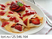 Crepes with strawberry jam and cream. Стоковое фото, фотограф Tetiana Chugunova / Фотобанк Лори