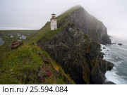 Lighthouse on a cliff above the sea. The Sea of Okhotsk. Peninsula Kony. Cape Taran. Magadan Region. Russia. Стоковое фото, фотограф Сергей Карпухин / Фотобанк Лори