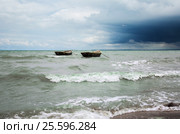 Bad weather, the waves of the sea and two boats. Стоковое фото, фотограф Анна Костенко / Фотобанк Лори