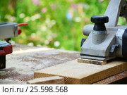 Electric planer is on board on the nature. Стоковое фото, фотограф Володина Ольга / Фотобанк Лори