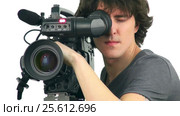 Professional cameraman, isolated on white background. Стоковое видео, видеограф Андрей Зык / Фотобанк Лори