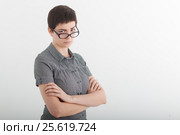 Portrait of beautiful young business woman or angry female teacher accusingly frowning over her glasses. Стоковое фото, фотограф Marina Sharova / Фотобанк Лори