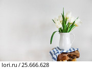 Tulips bouquet in white vase on wooden rustic chair. Стоковое фото, фотограф Дарья Петренко / Фотобанк Лори