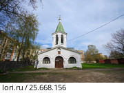 May 1st 2016 - Mid-Pentecostal Church (1494)/ Church of Pentecost in the cutting off of the Saviour farmstead, situated in-between soviet building at Detskaya street, Pskov, Russia. Стоковое фото, фотограф Мария Сидельникова / Фотобанк Лори