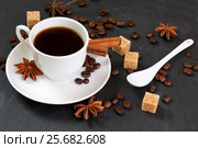 Black coffee with cinnamon, anise and cane sugar. Стоковое фото, фотограф Феликс Хромых / Фотобанк Лори