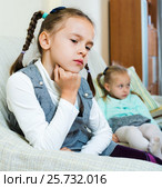Portrait of two little upset miserable girls having conflict. Стоковое фото, фотограф Яков Филимонов / Фотобанк Лори