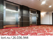 Two elevators with metal doors in hotel. Стоковое фото, фотограф Володина Ольга / Фотобанк Лори