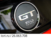 BERLIN - JUNE 14, 2015: The emblem of a pony car Ford Mustang 50th Anniversary Edition, 2015. The Classic Days on Kurfuerstendamm. Редакционное фото, фотограф Sergey Kohl / Фотобанк Лори