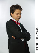 The boy in evening dress on white background. Стоковое фото, фотограф Александр Белов / Фотобанк Лори