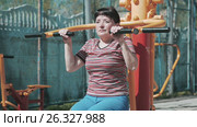 A woman of older age. Training, exercises. Стоковое видео, видеограф Сергей Мнацаканов / Фотобанк Лори