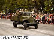 RUSSIAN, KOZELSK, MAY 9, 2017, Victory Day, May 9. Military Parade on anniversary of Victory in Great Patriotic War. Old truck GAZ-AA. Retro military vehicle With Re-Enactors Dressed As Red Army Soldiers. Редакционное фото, фотограф Олег Безруков / Фотобанк Лори