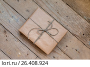 Vintage gift box on wooden background. Стоковое фото, фотограф Валерий Бочкарев / Фотобанк Лори